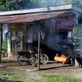 
              В колоритного вида сараях, пыхтя каким-то дымом, да бряцая пузатыми компрессорами, расположены очаги бурной придорожной деятельности -
              круглосуточные шиномонтажки. На некоторых так и висят объявления о продаже воздуха 24 часа в сутки.
            